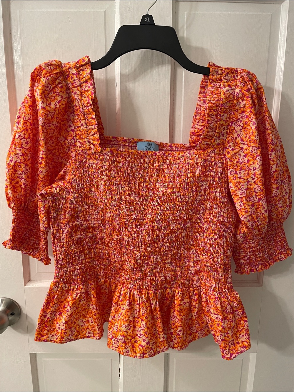 NWOT CeCe Smocked Floral Peplum Top